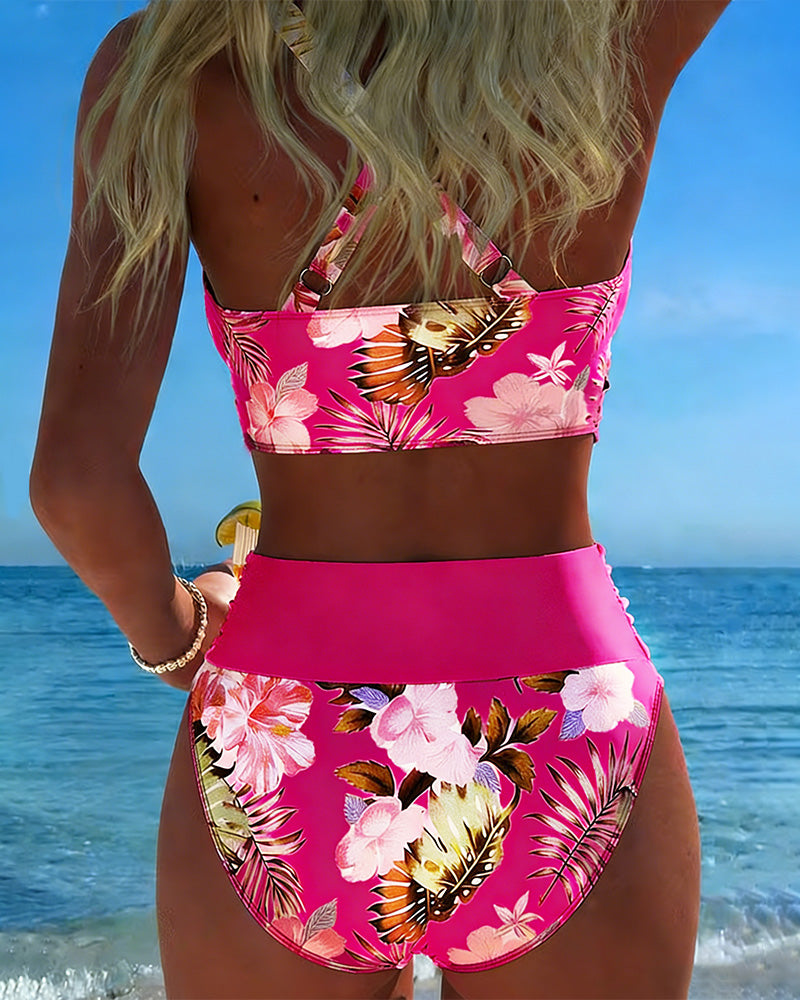 Chic women's floral print split bikini, a stylish two-piece swimsuit for beach and summer.
