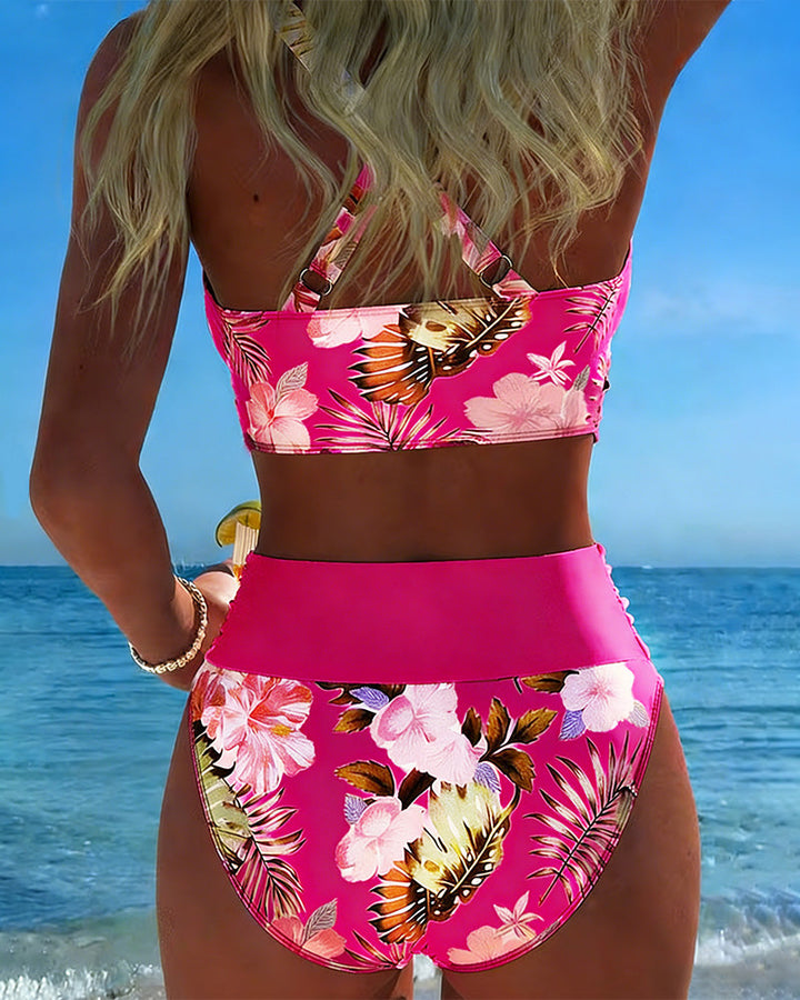 Chic women's floral print split bikini, a stylish two-piece swimsuit for beach and summer.