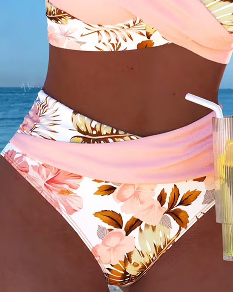 Floral print women's bikini set, a trendy split swimsuit for summer and beach days.