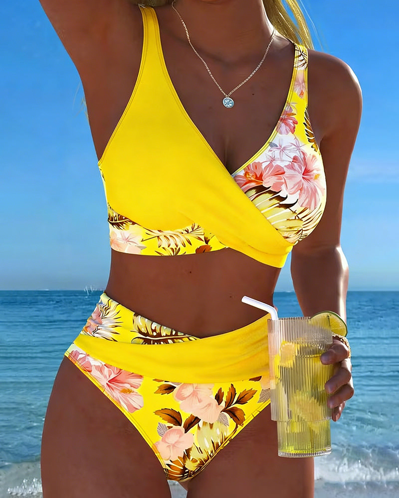 Vibrant floral print women's two-piece bikini set, perfect stylish swimwear for summer.