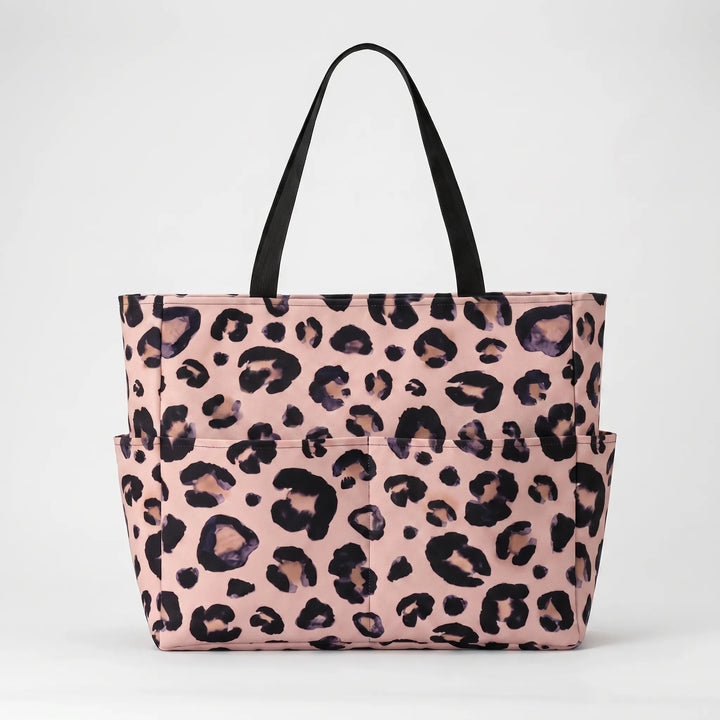 Chic leopard print shoulder bag for women, a large and spacious tote ideal for beach, travel, or everyday use.