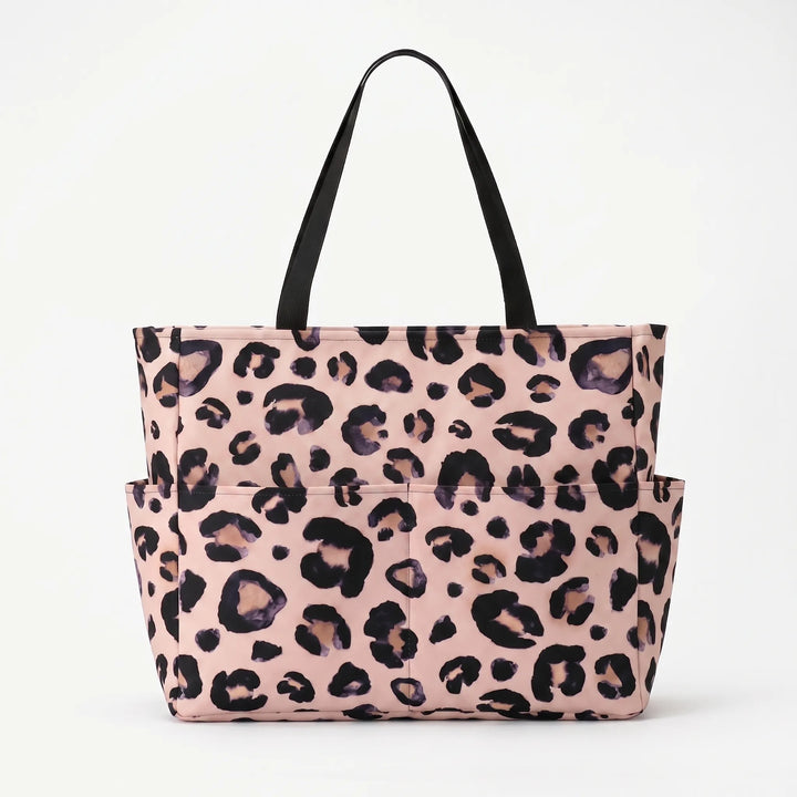 Large women's leopard print tote bag, a stylish and spacious beach or travel shoulder bag for women.