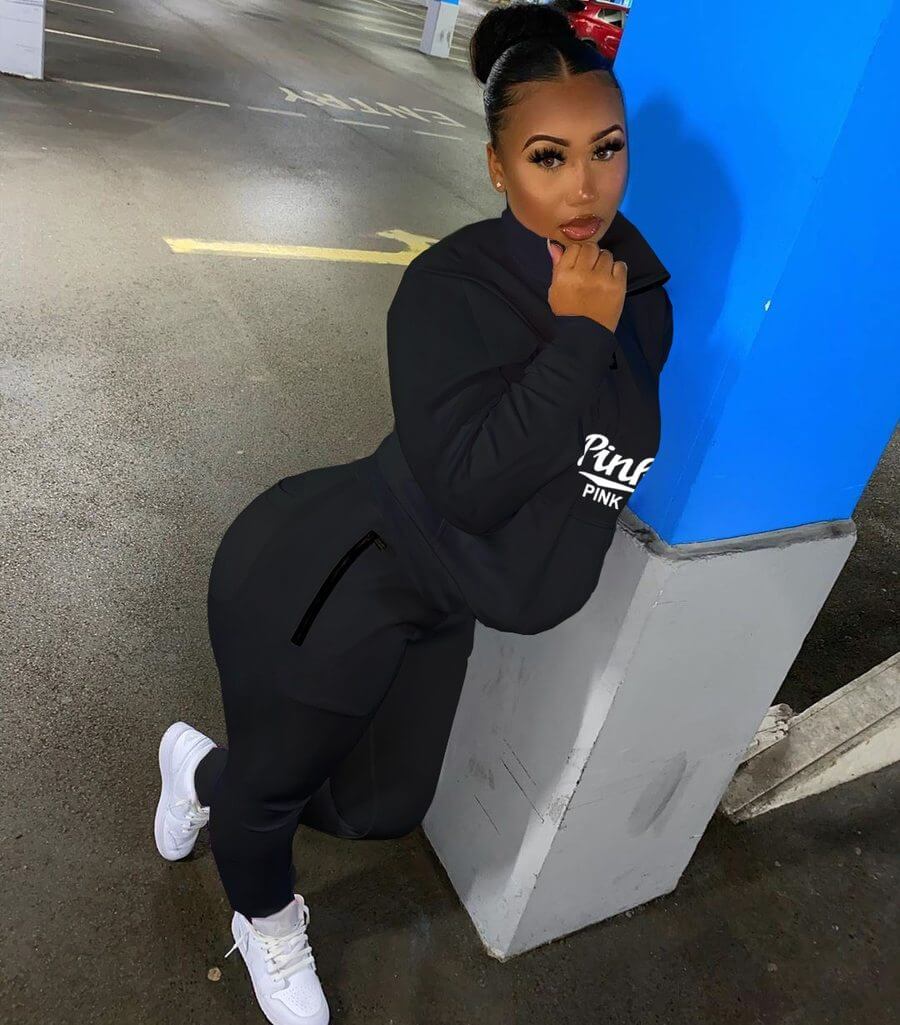 Modern women's letter print tracksuit set, blending style with activewear.