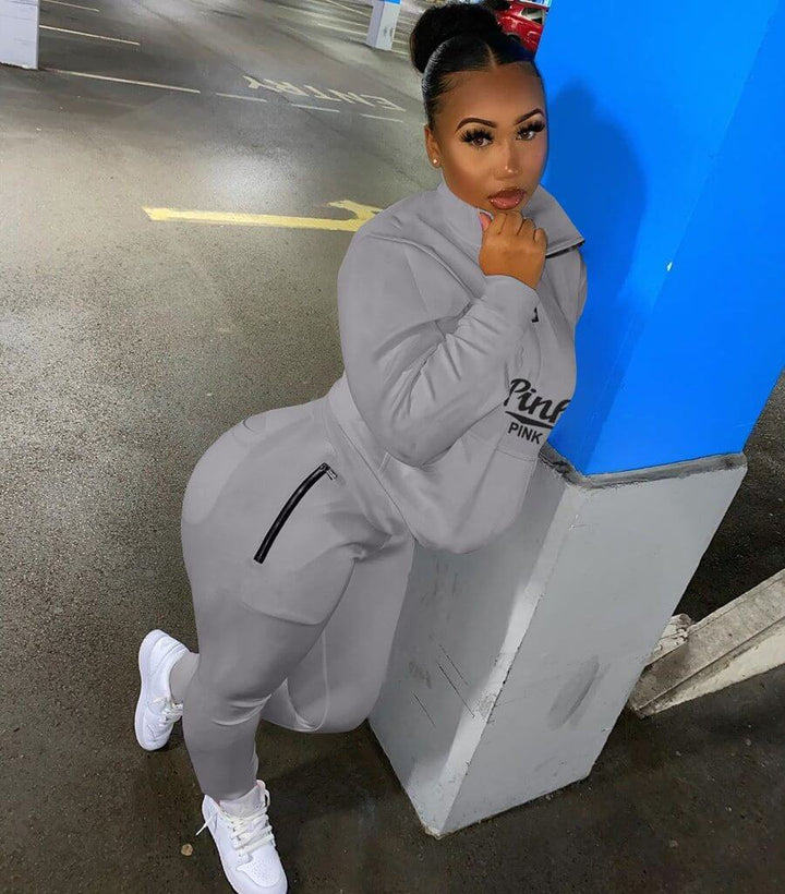 Versatile women's letter print tracksuit, suitable for sportswear or casual outfits.