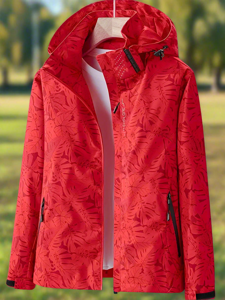 Breathable women's waterproof rain jacket with adjustable hood, ideal for outdoor summer wear.