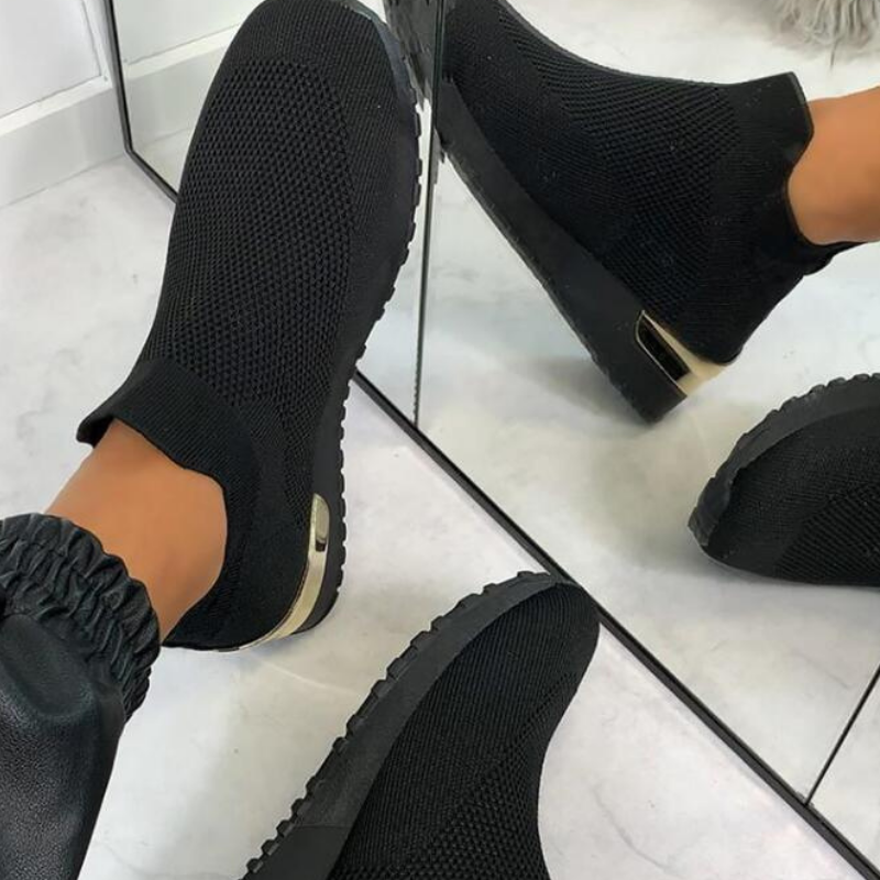 Orthopedic women's sneakers with breathable material, offering comfortable support for all-day pain relief.