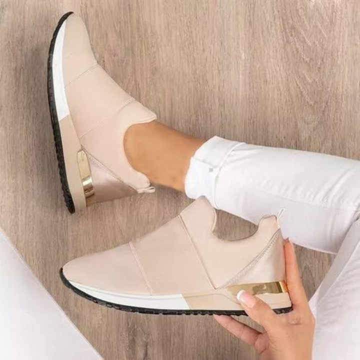 Elegant women's orthopedic sneakers, providing comfortable pain relief and stylish support for healthy feet.