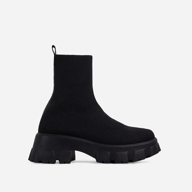 Women's stylish slip-on ankle boots, versatile and comfortable footwear for everyday fashion.