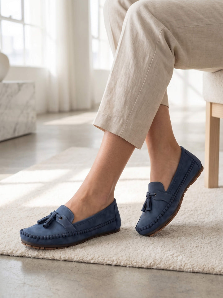 Women's classic moccasin loafers featuring stylish tassels; comfortable slip-on casual flats.