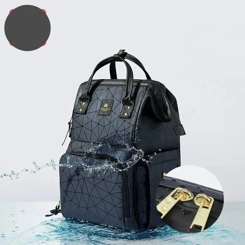 Women's stylish waterproof diaper backpack for moms, large capacity baby bag.