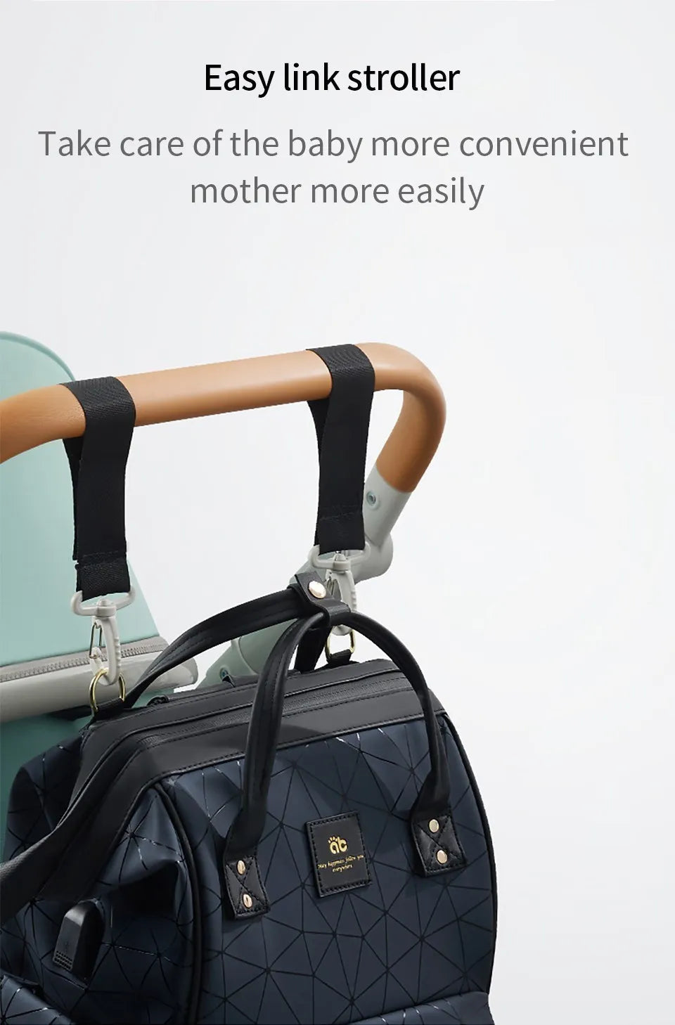 Waterproof diaper backpack on a stroller, convenient baby transport solution.