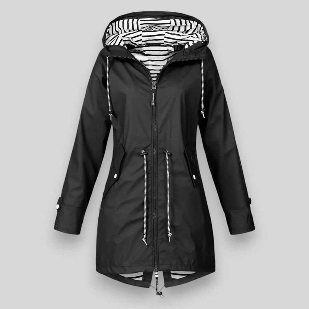 Sleek women's waterproof rain jacket, offering modern style and reliable rain protection for active women.