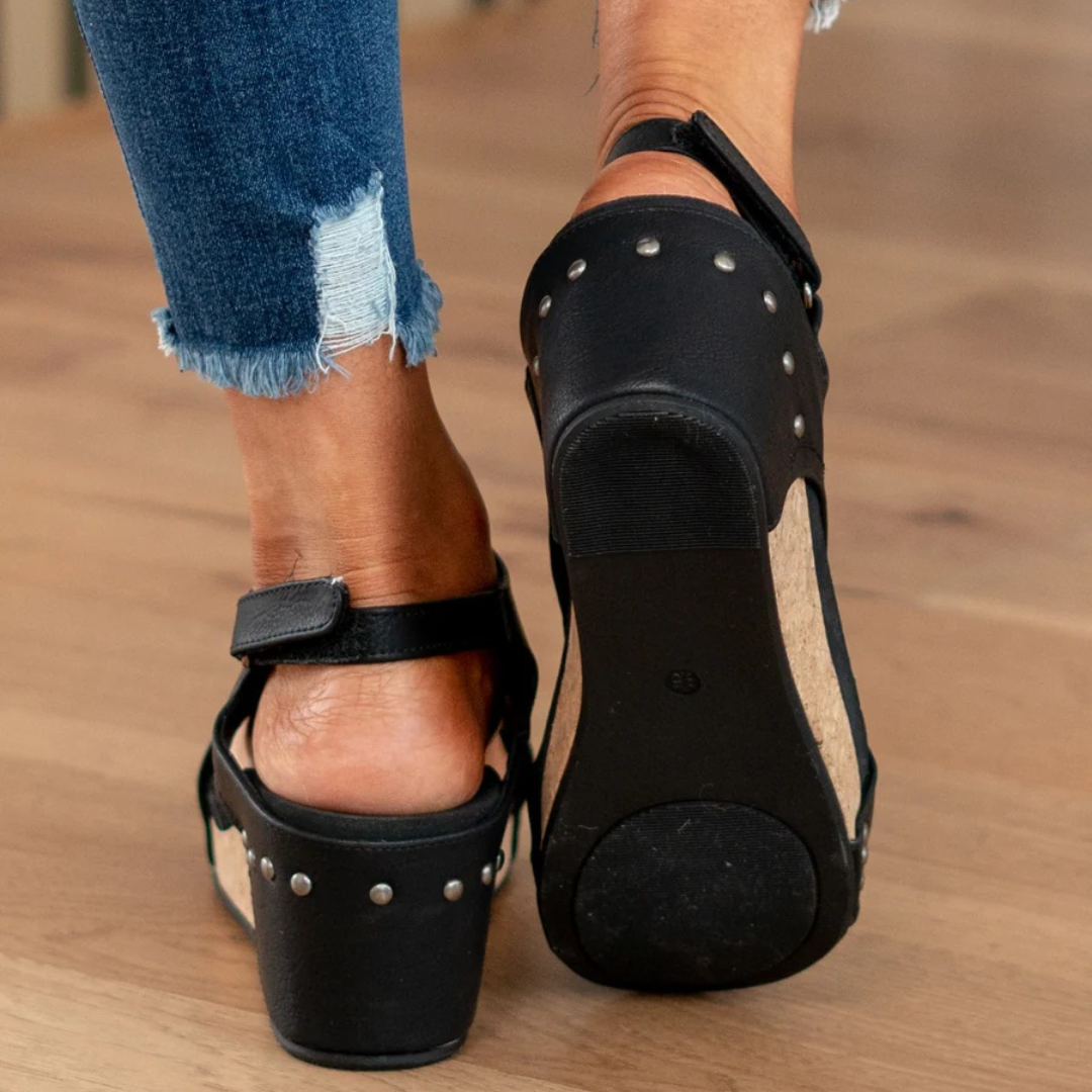Fashionable women's wedge sandals, providing both style and comfort for summer occasions.