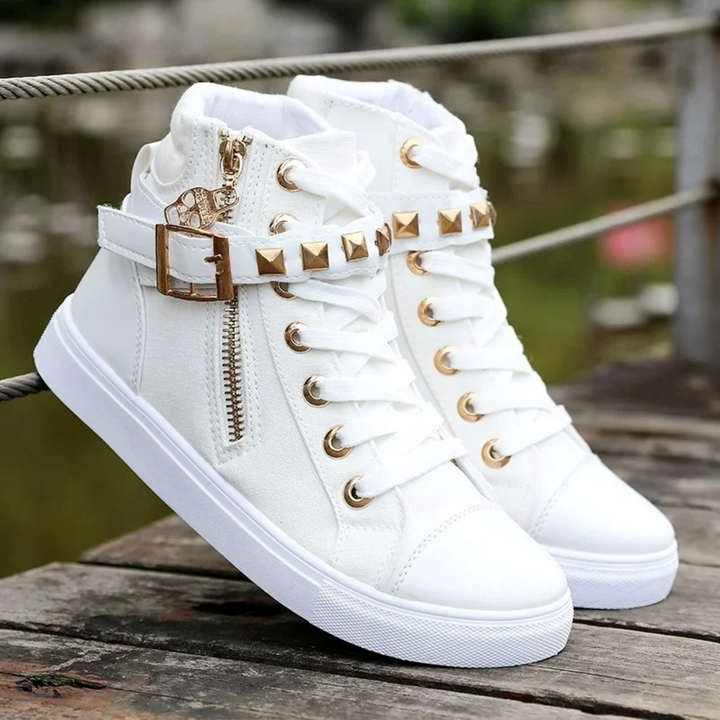 Women's stylish white high-top sneakers with a functional side zip, perfect for casual everyday wear.