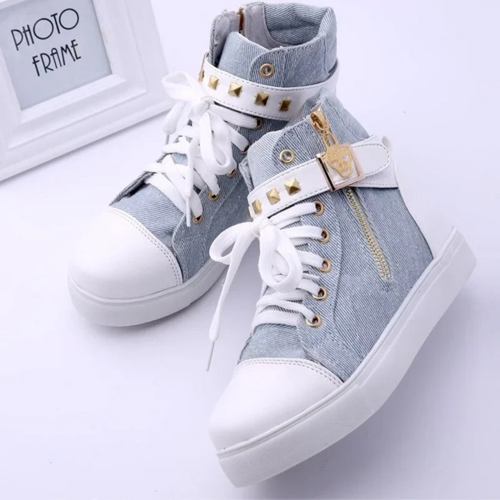 Fashionable white high-top sneakers for women with a sleek side zip, ideal for trendy casual outfits.