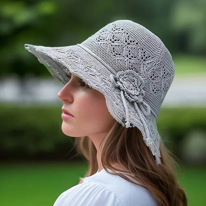 Foldable wide brim sun hat for women, featuring a beautiful lace pattern; ideal for travel & beach.