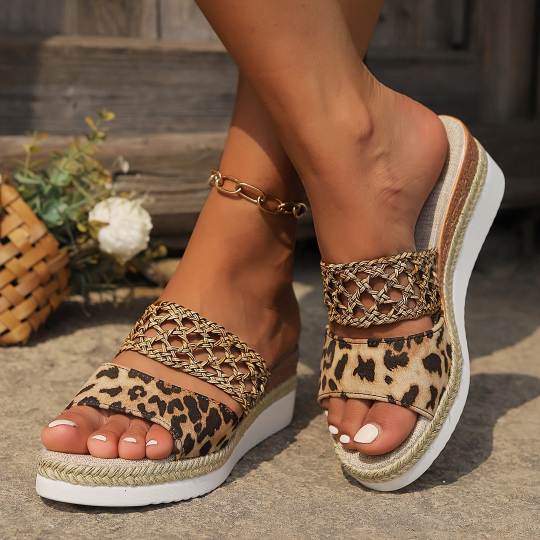 Comfortable women's open-toe woven wedge sandals for vacation.