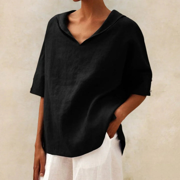 Versatile women's casual blouse, featuring a button-front design and stylish roll-up sleeves for summer comfort.