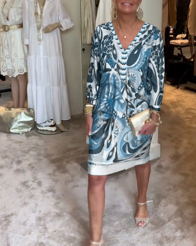 Women's Sunburst Boho Printed Tunic, a stylish v-neck maxi dress with artistic flowy design.