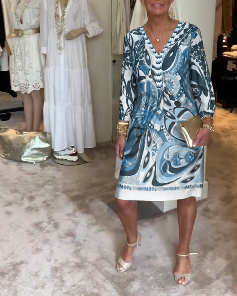 Women's Sunburst Boho Tunic Dress, an artistic printed v-neck perfect for summer daily fashion.