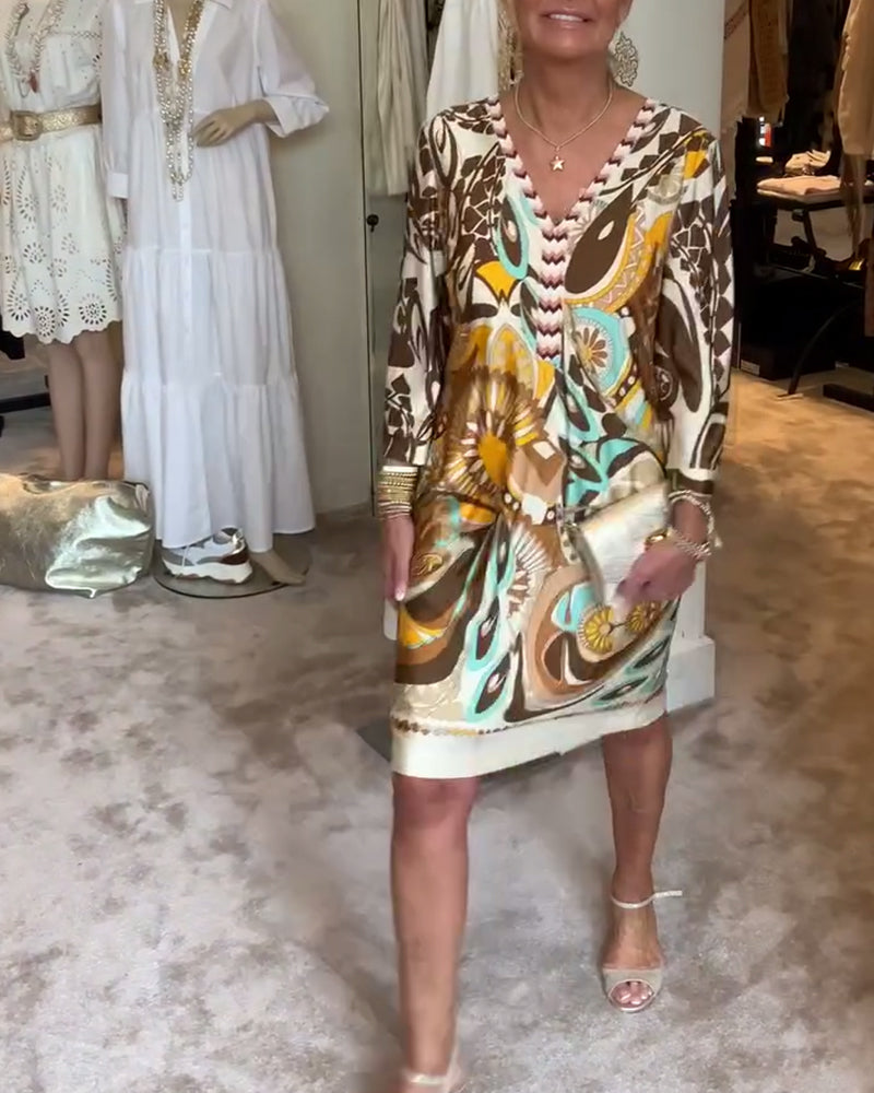 Flowy Sunburst Boho Printed Tunic Dress for women, a comfortable v-neck casual maxi style.