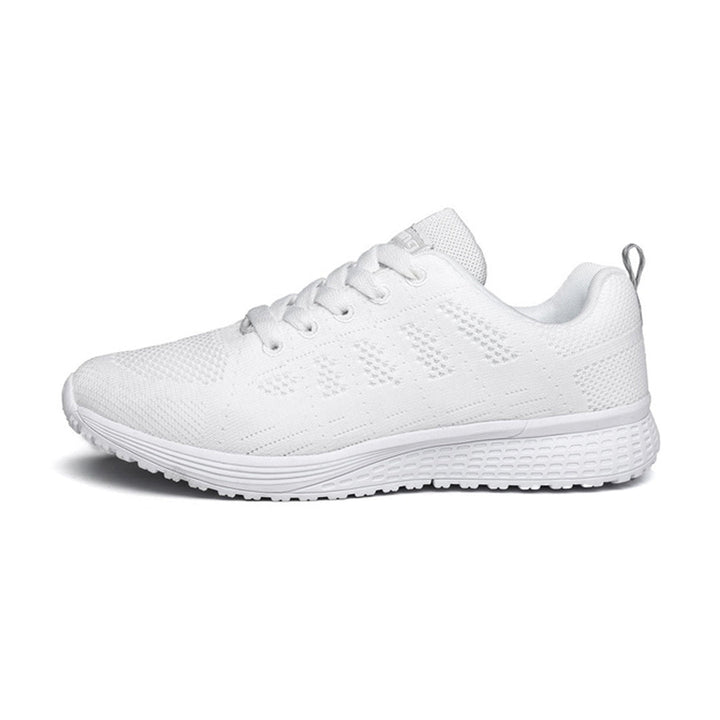 Women's supportive comfort sneakers with adjustable hook-and-loop straps, ergonomic design, and cushioned arch support.