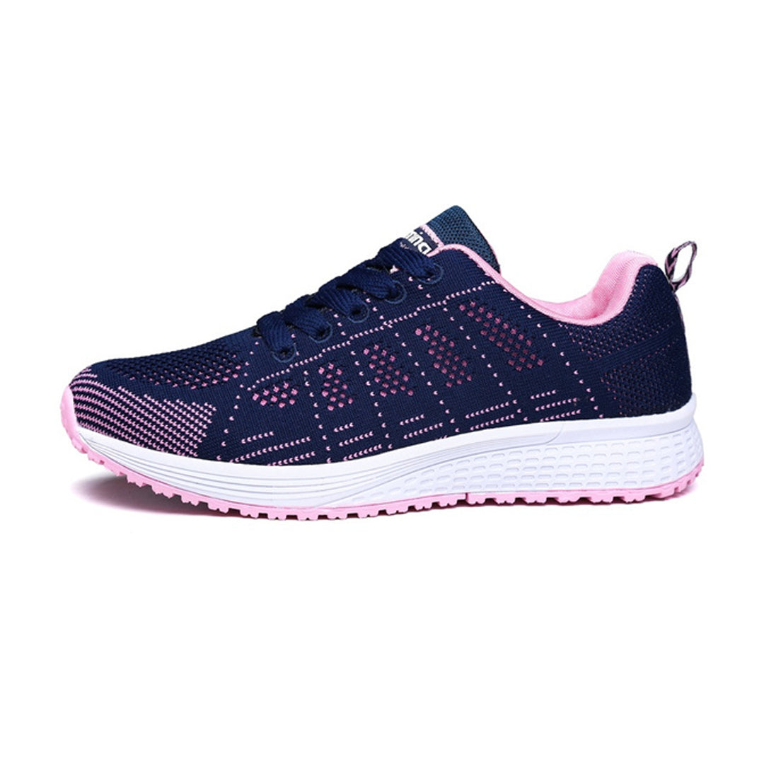 Front view of women's comfort walking sneakers. Features adjustable straps, ergonomic arch support, and cushioning.