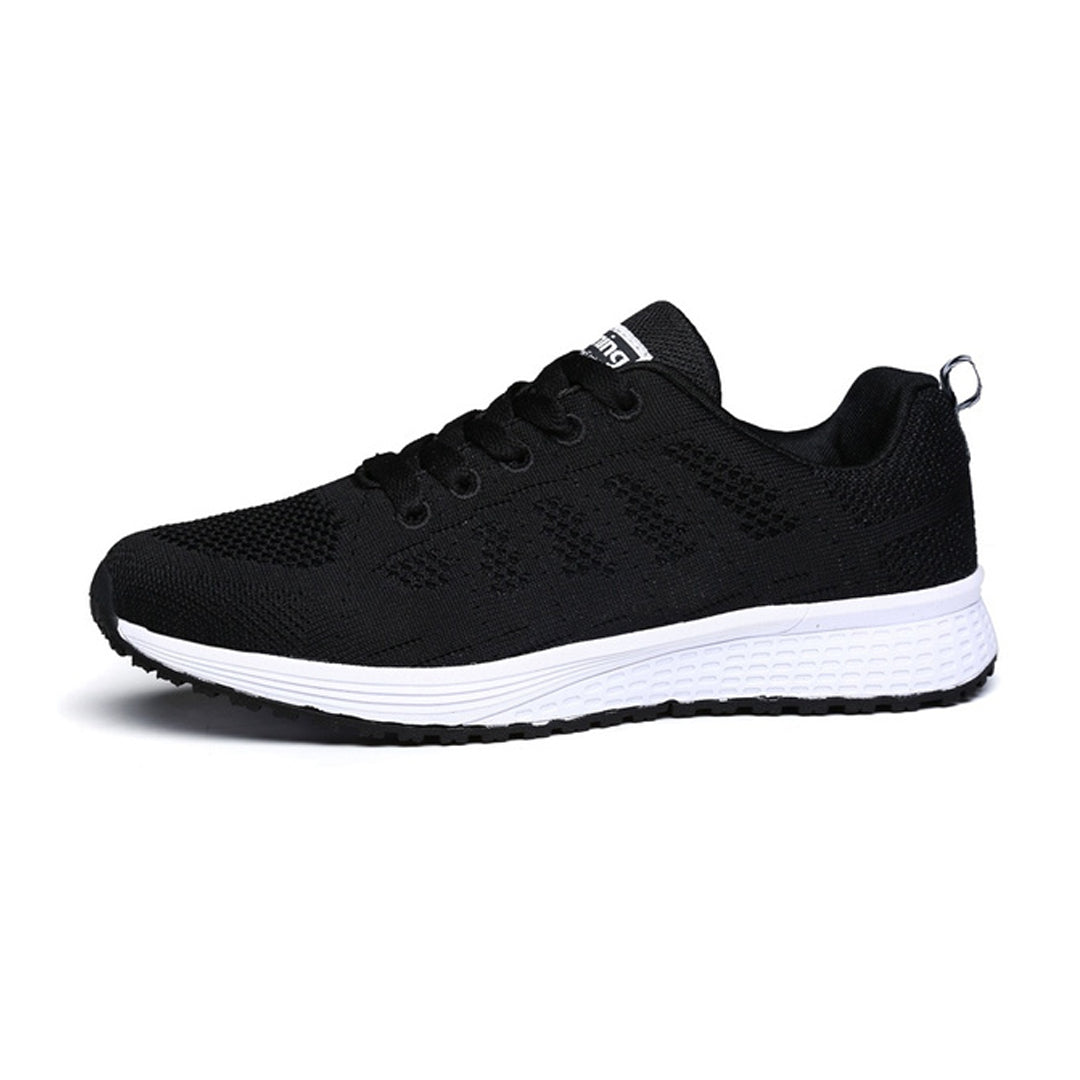 Side view of women's supportive sneakers. Shows cushioned sole, adjustable straps, and arch support for walking comfort.