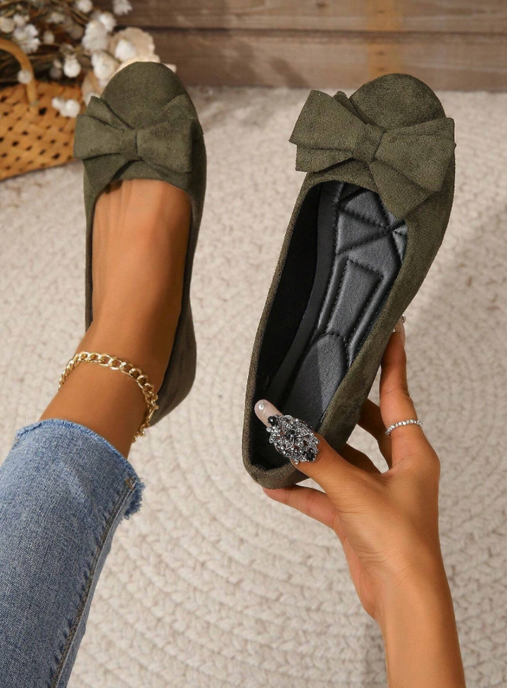 Women's supportive cushioned loafer flats for everyday wear. Comfortable walking shoes in various colors.