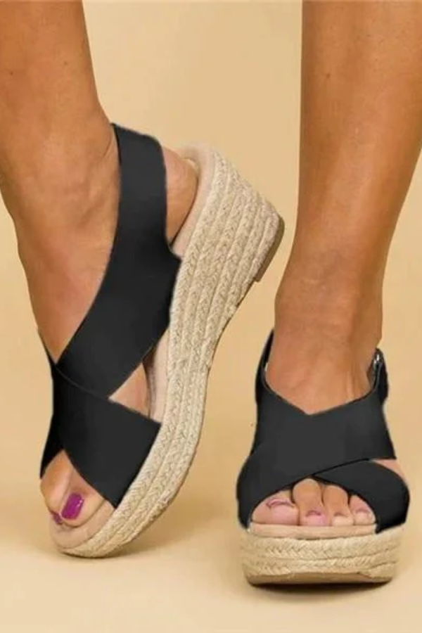 Elegant women's espadrille wedge sandals providing orthopedic support & a stylish lift for any occasion.