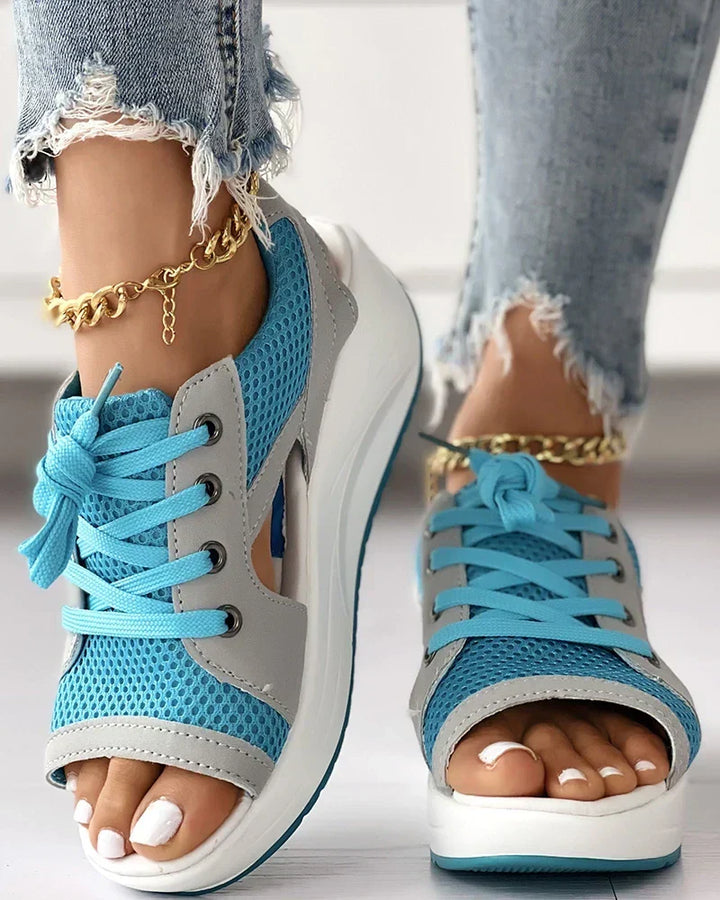 Women's supportive lace-up sandals with an airy design, perfect for comfortable summer wear and everyday foot comfort.