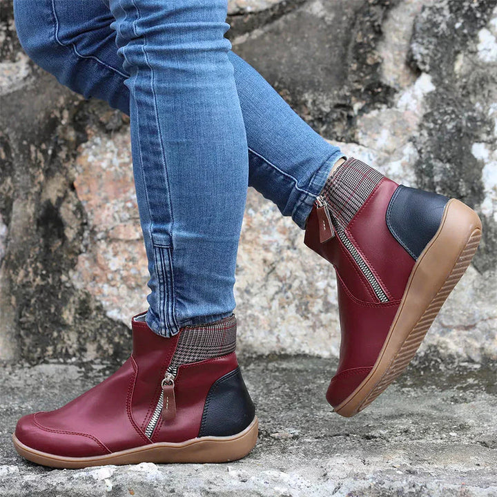 Women's supportive orthopedic ankle boots for comfort & foot relief.