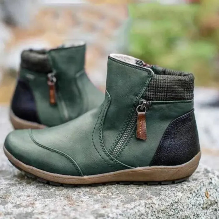 Fashionable women's orthopedic ankle boots, essential supportive footwear for foot health.