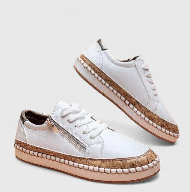 Flexible women's slip-on walking shoes with arch support, providing stable and comfortable orthopedic wear.