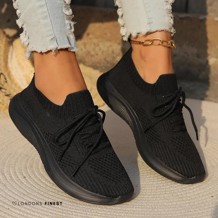 Lightweight women's walking sneakers, designed for all-day comfort with supportive sole and modern style. Ideal for active lifestyle.