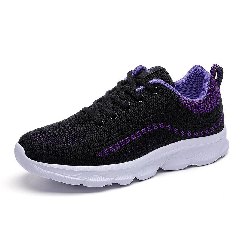 Women's supportive walking shoes in a stylish design, offering breathable comfort and arch support for active lifestyles.