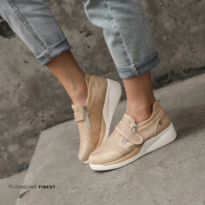 Women's supportive walking shoes with cushioned arch support, designed for comfort and foot health.