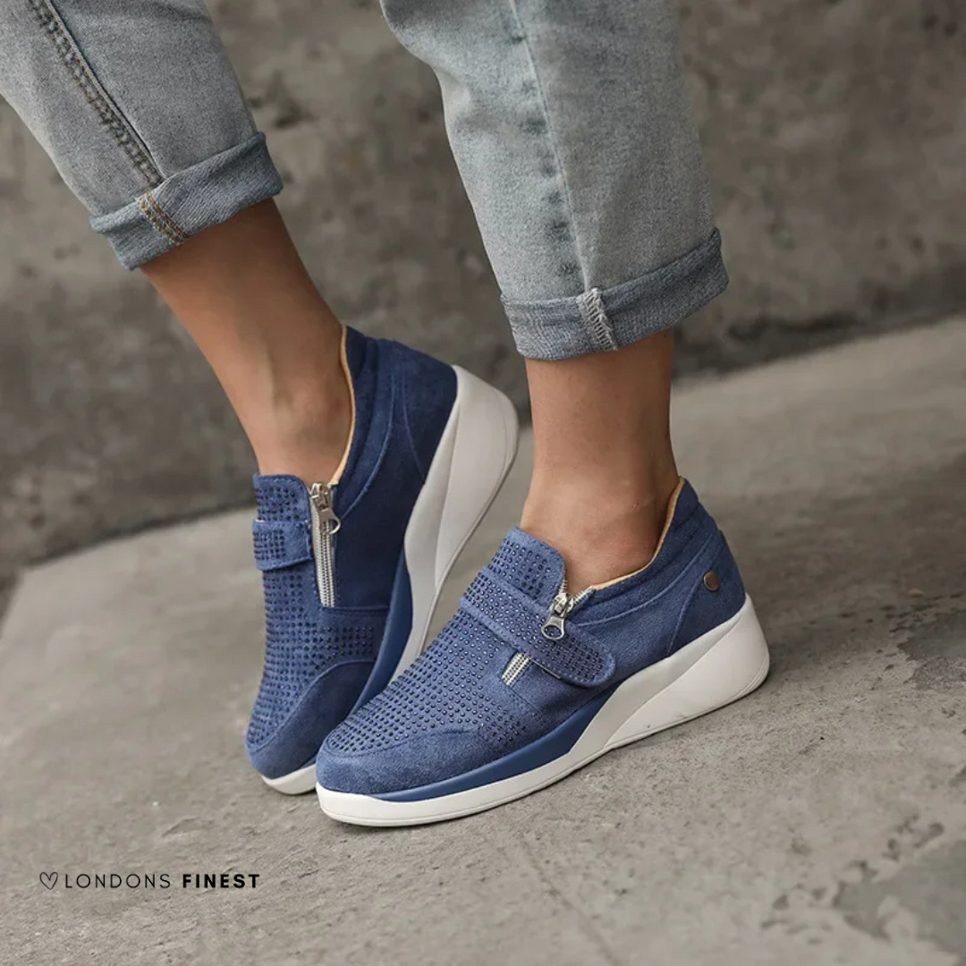 Lightweight women's walking shoes with adjustable strap, cushioned arch support, and foot health benefits.