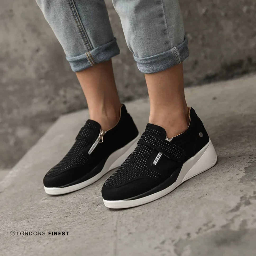 Women's supportive everyday sneakers with cushioned arch support for comfortable, all-day walking.