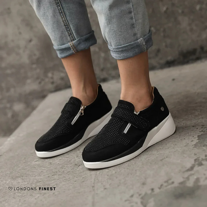 Women's supportive everyday sneakers with cushioned arch support for comfortable, all-day walking.