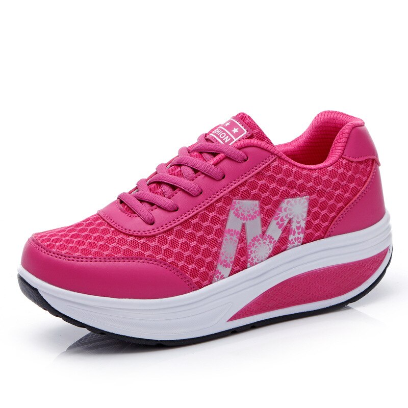 Lightweight women's walking sneakers with arch support and breathable design.