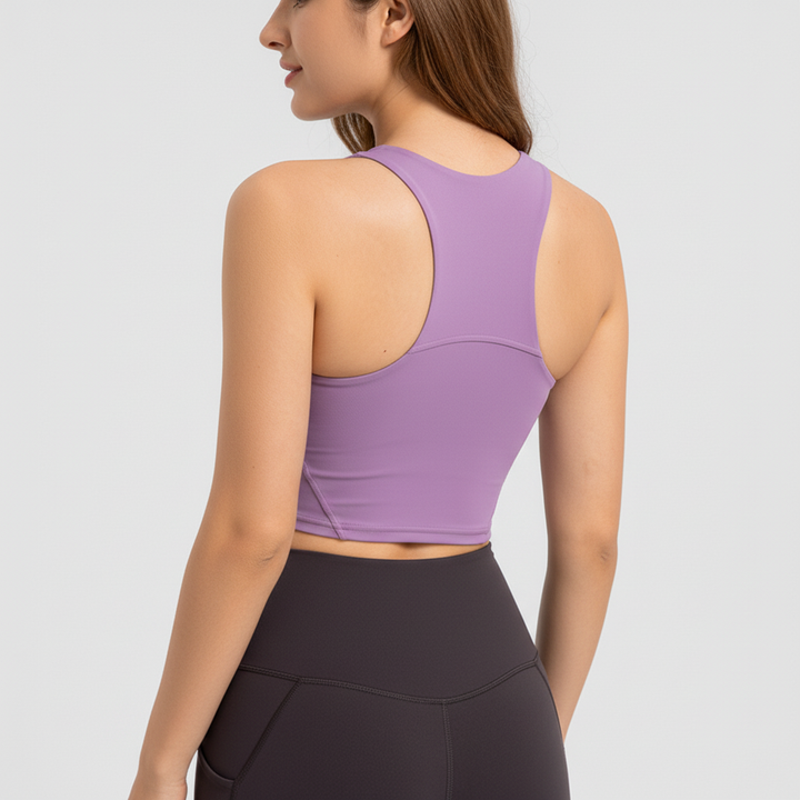 Women's fitness wear top, supportive design, and convenient removable pads.