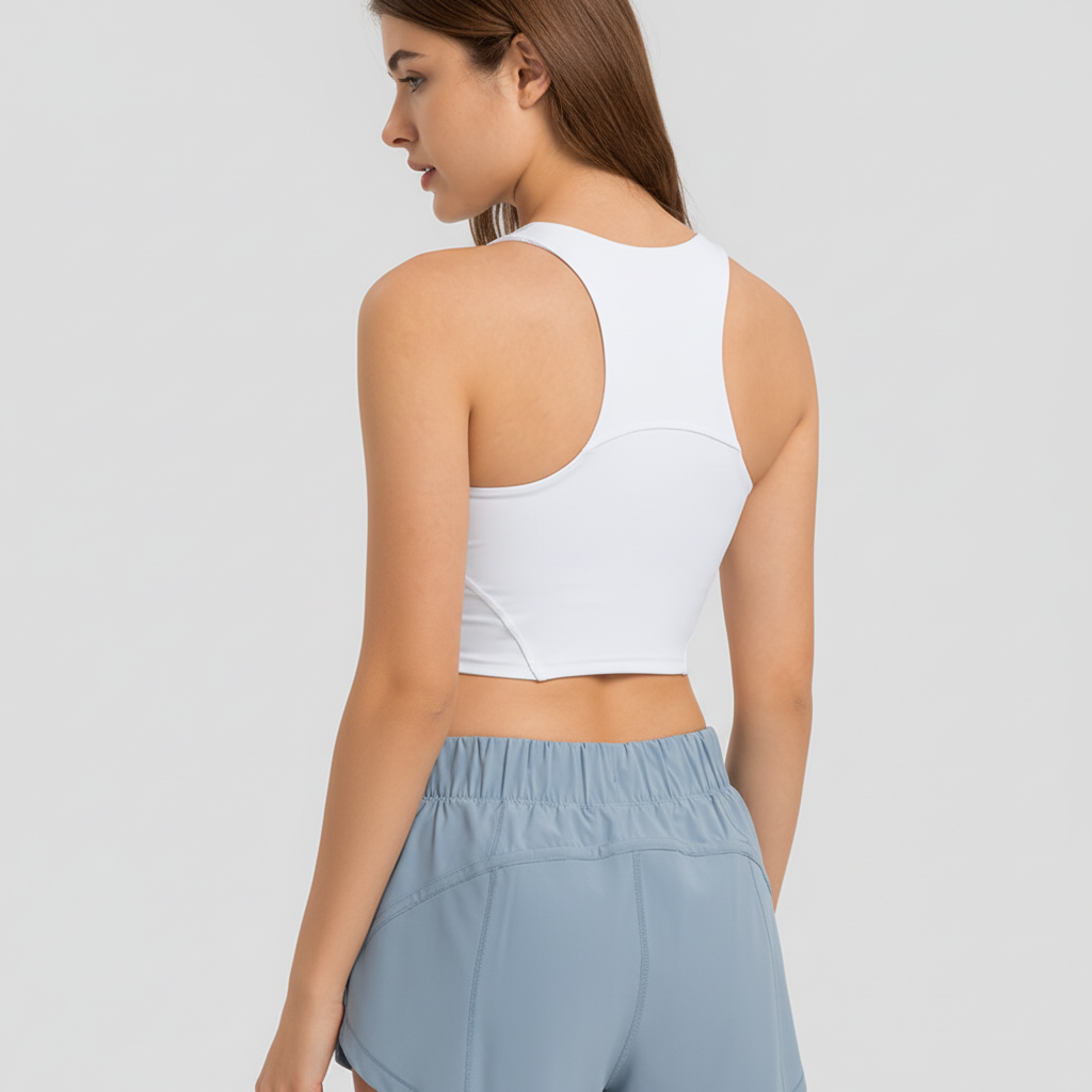 Comfortable women's athletic top, supportive fit, and removable chest pads.