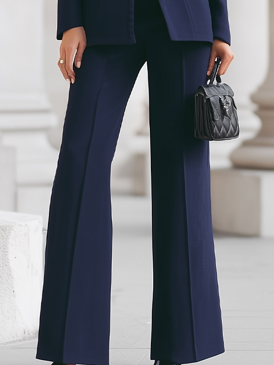 Formal women's tailored suit set, blazer & trousers for professional meetings, business attire & special events.