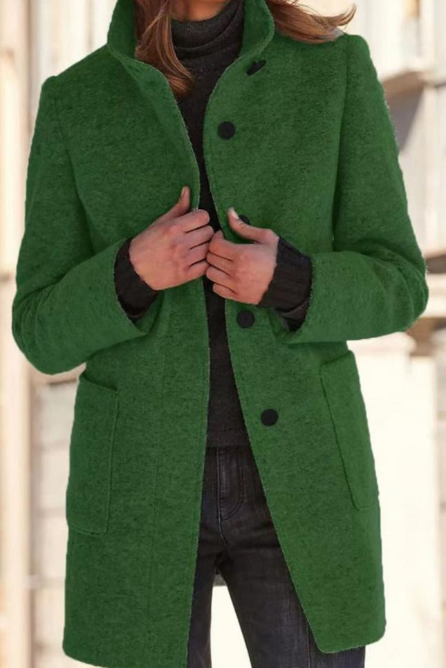 Elegant women's mid-length coat featuring button closure. Versatile for work, casual, or transitional fashion.