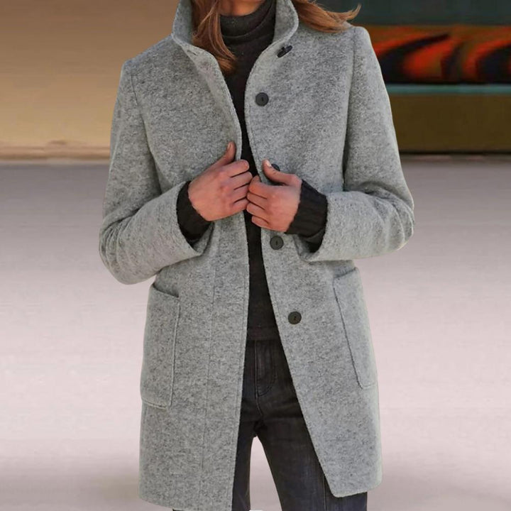 Fashionable women's mid-length tailored coat, chic button design, perfect for stylish fall & winter layering.