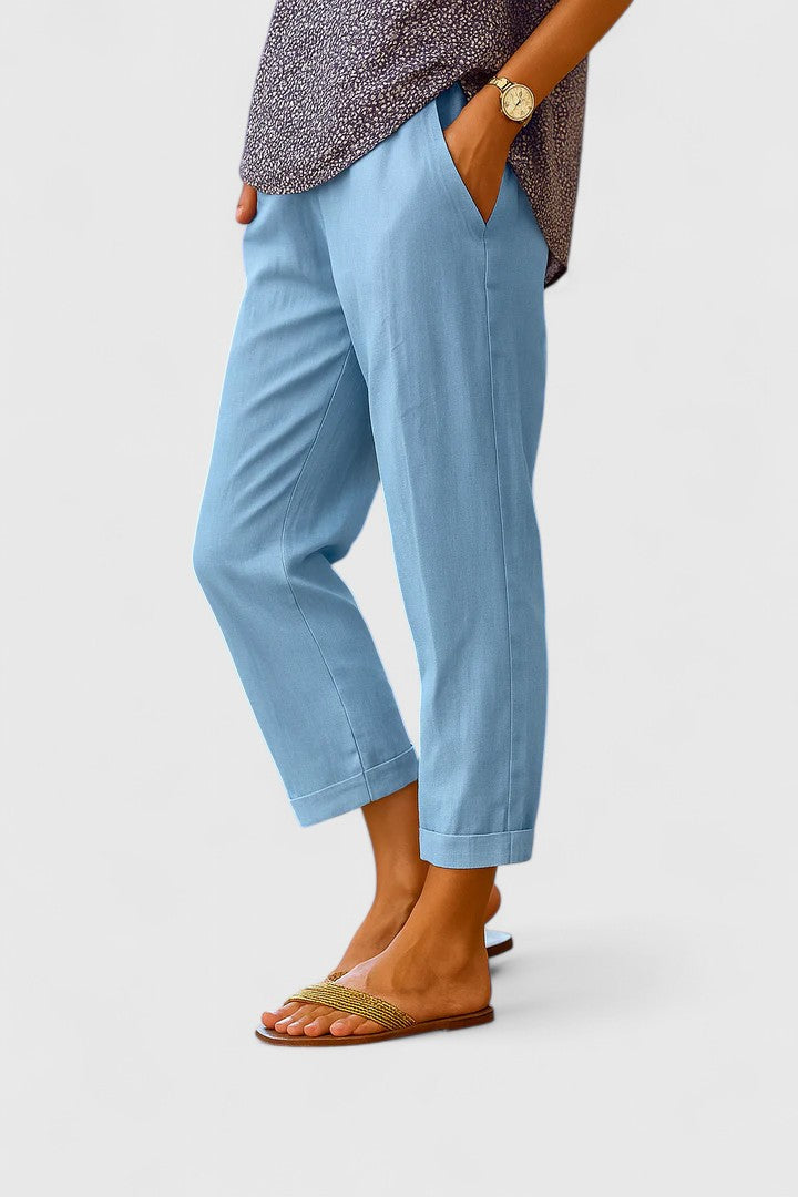 Women's tailored straight leg pants with cuff hem, pockets. Perfect for professional or smart casual wear.