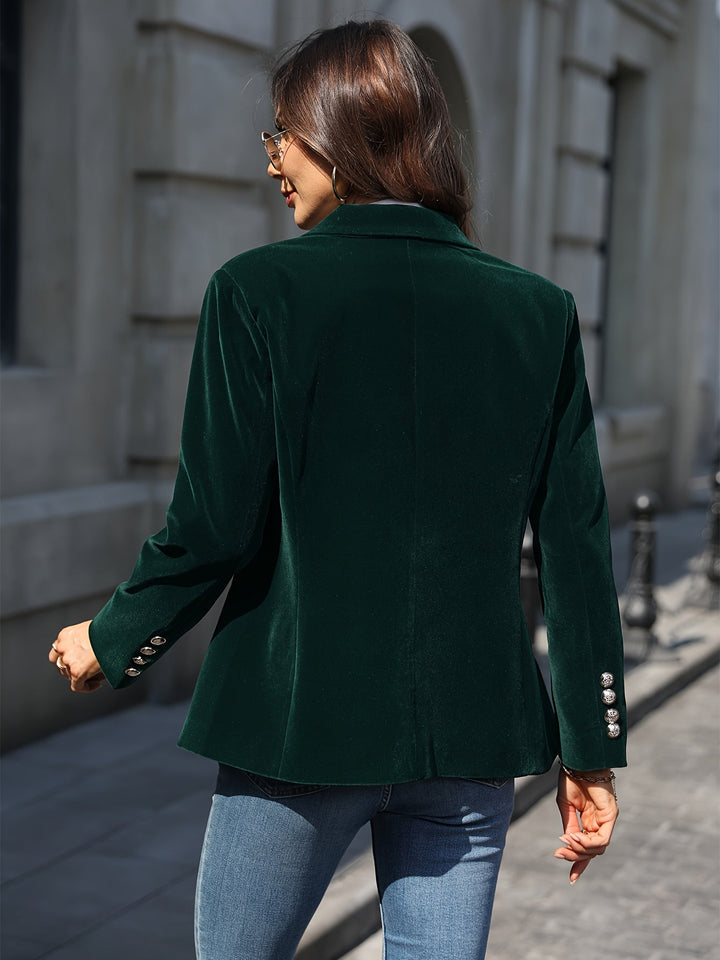 Sophisticated women's tailored blazer, ideal for workwear or evening, featuring stylish gold buttons.