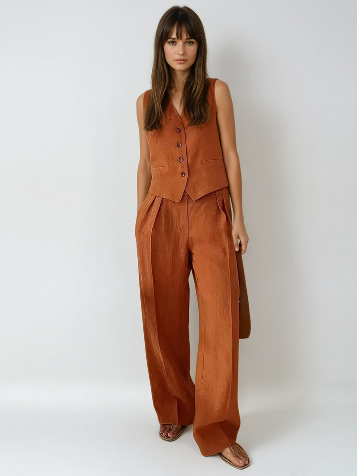 Women's tailored waistcoat and wide leg trouser set in a chic, elegant style. Perfect two-piece for office or smart casual.