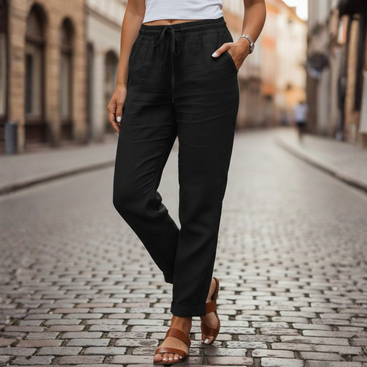 Full view of women's comfortable tapered drawstring summer pants, showcasing their relaxed fit.